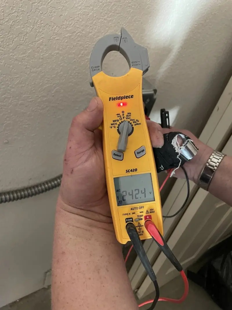 Voltage testing with clamp meter during Aluminum Wiring Replacement in Wilmette
